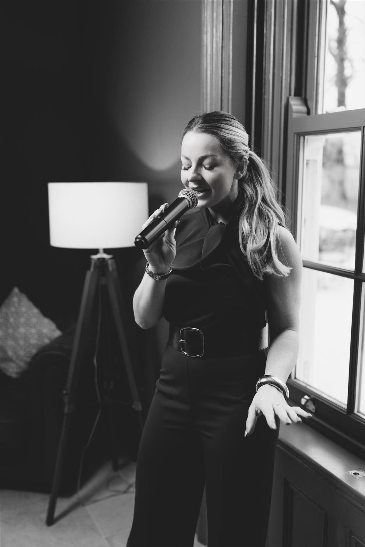 Abigail singing, black and white