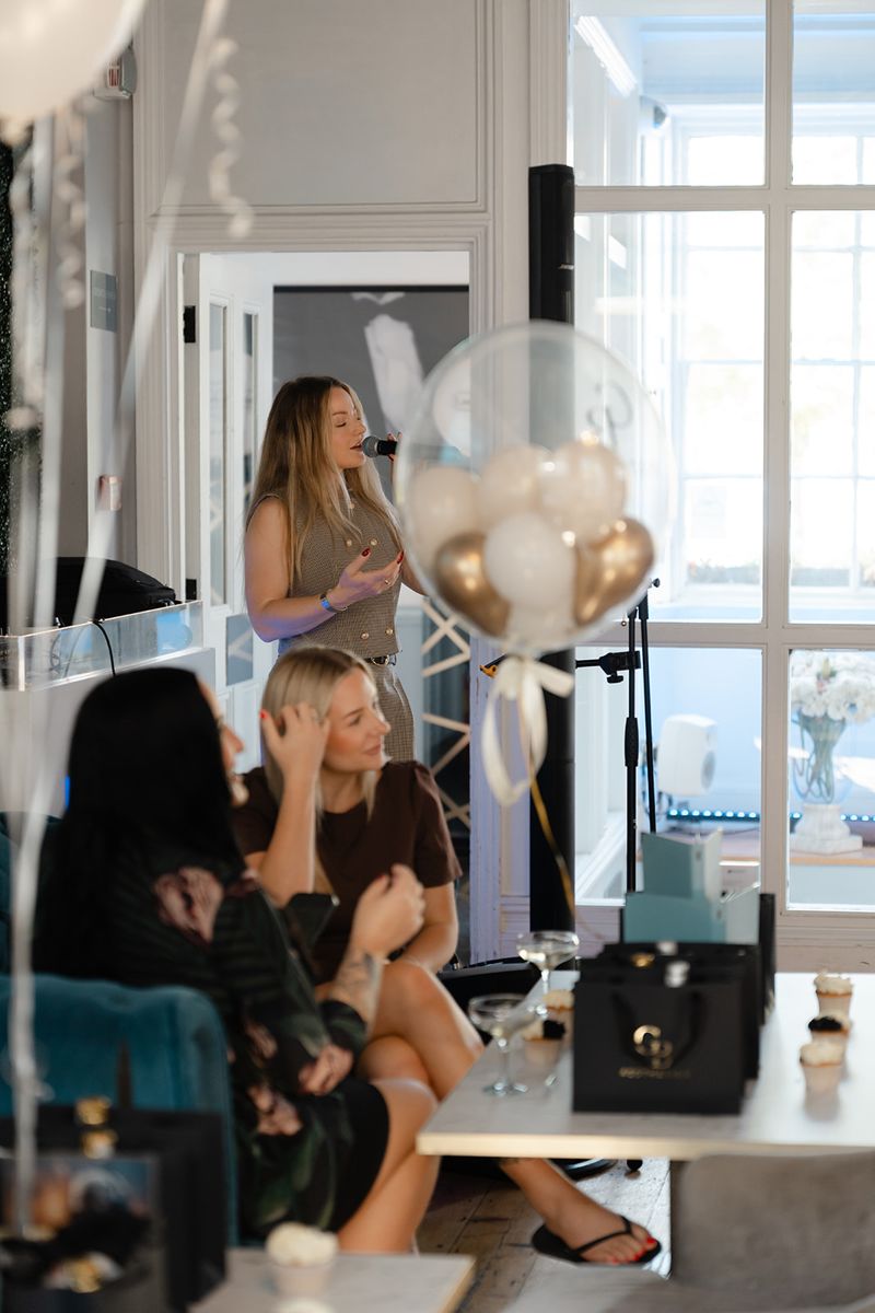Abigail singing at a celebration